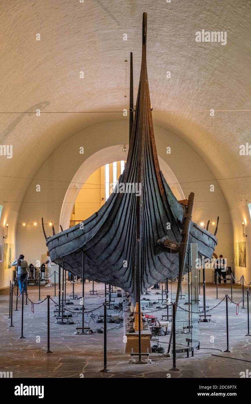 Oslo, Ostlandet / Norway - 2019/08/31: Oseberg ship excavated from ship burial archeological site, exhibited in Viking Ship Museum on Bygdoy peninsula Stock Photo