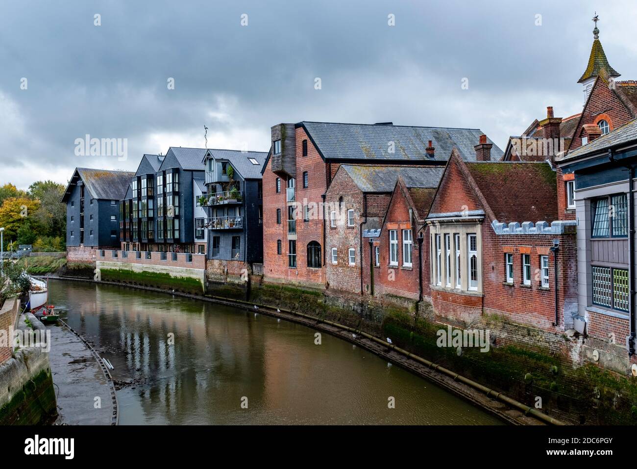 Riverside Buildings In Lewes, East Sussex, UK, Photographed During A Low Tide Of The River Ouse. Stock Photo