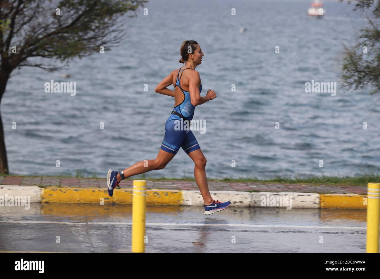 ISTANBUL, TURKEY - OCTOBER 18, 2020:  Undefined athlete competing in running component of Istanbul Sprint Triathlon Stock Photo