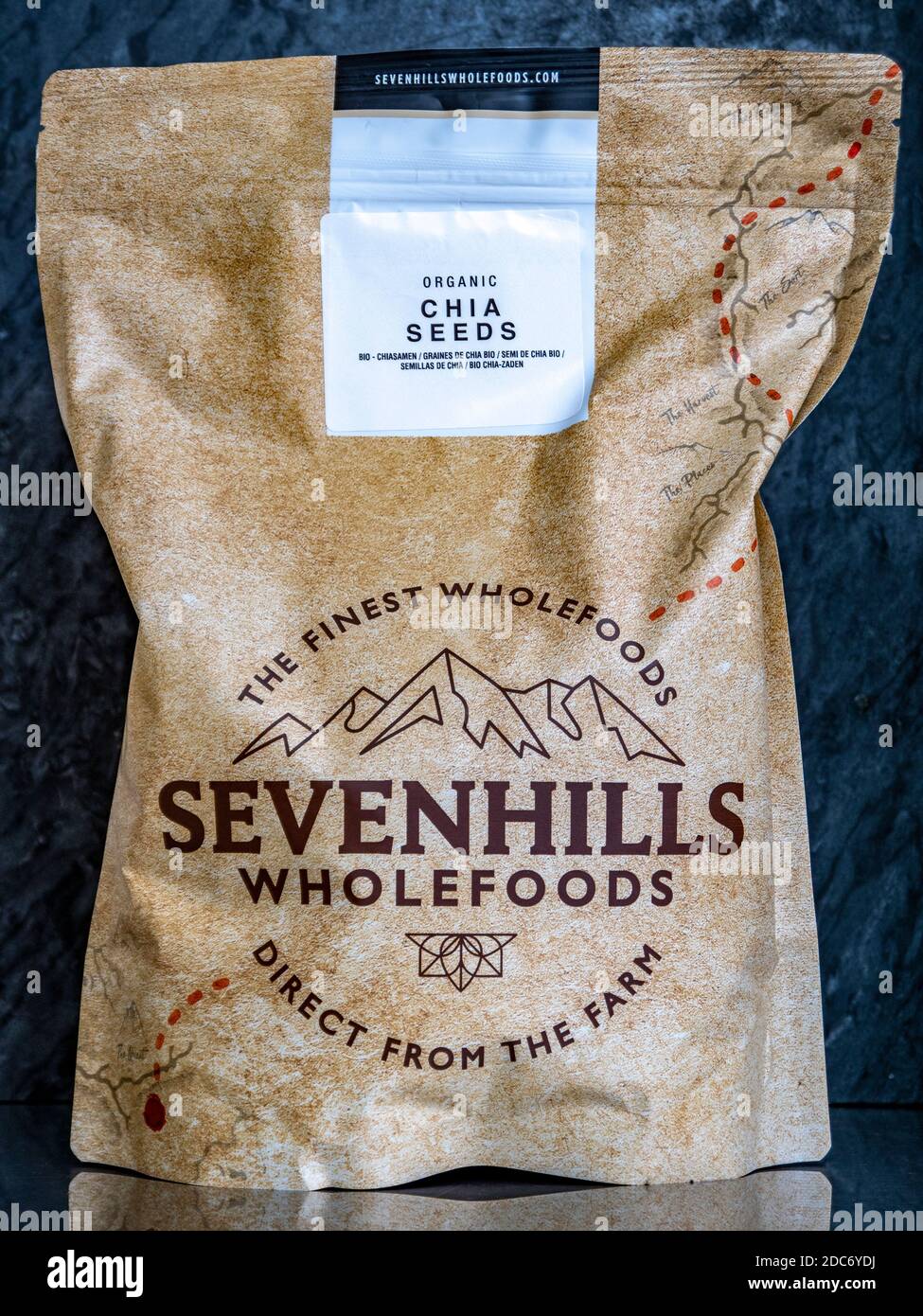 Closeup of a retail unopened pack of Sevenhills Wholefoods organic chia seeds, standing on a shelf. Stock Photo