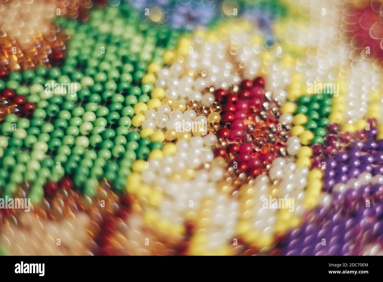 Multi colored glass beads on a white background texture pattern for