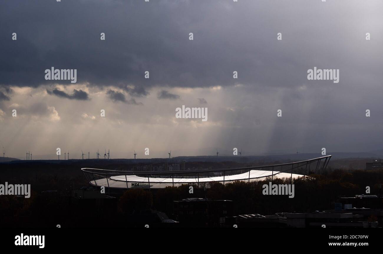 Hanover, Germany. 19th Nov, 2020. The roof of the HDI Arena reflects brightly as the sun breaks through dark clouds for a brief moment. Credit: Julian Stratenschulte/dpa/Alamy Live News Stock Photo