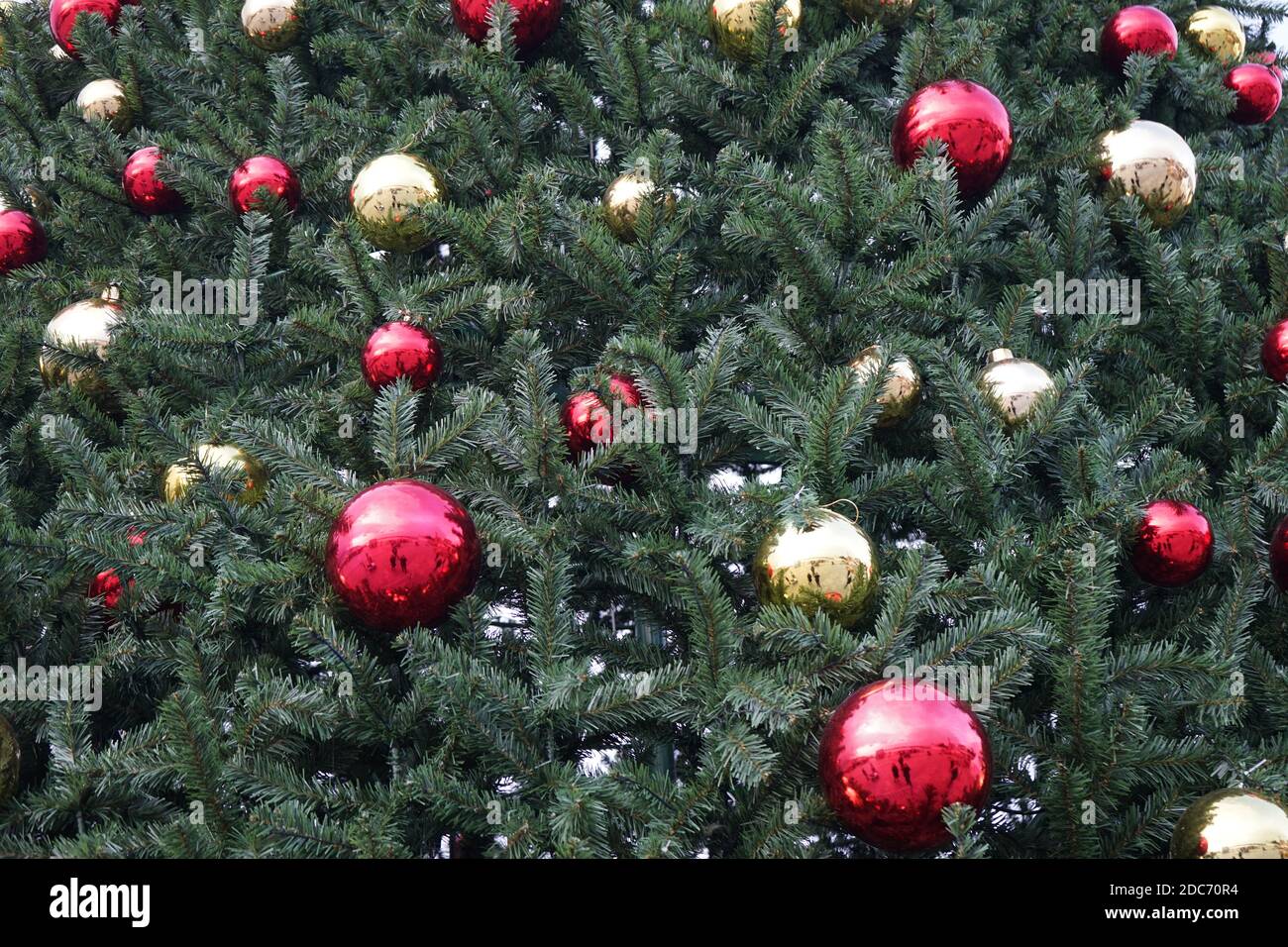 christmas tree with multi-colored balls and decorations background Stock Photo