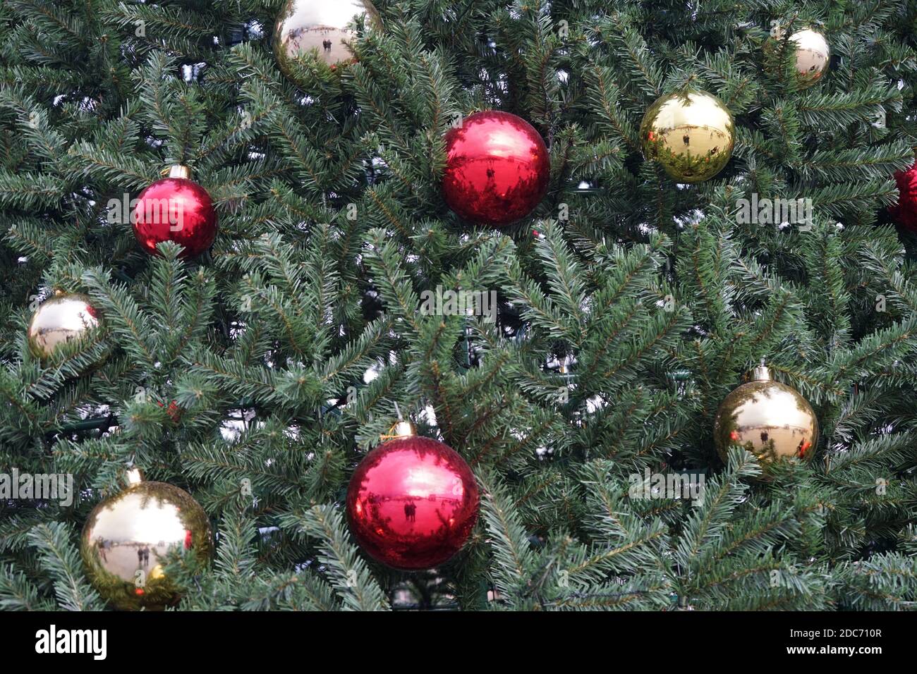 christmas tree with multi-colored balls and decorations background Stock Photo