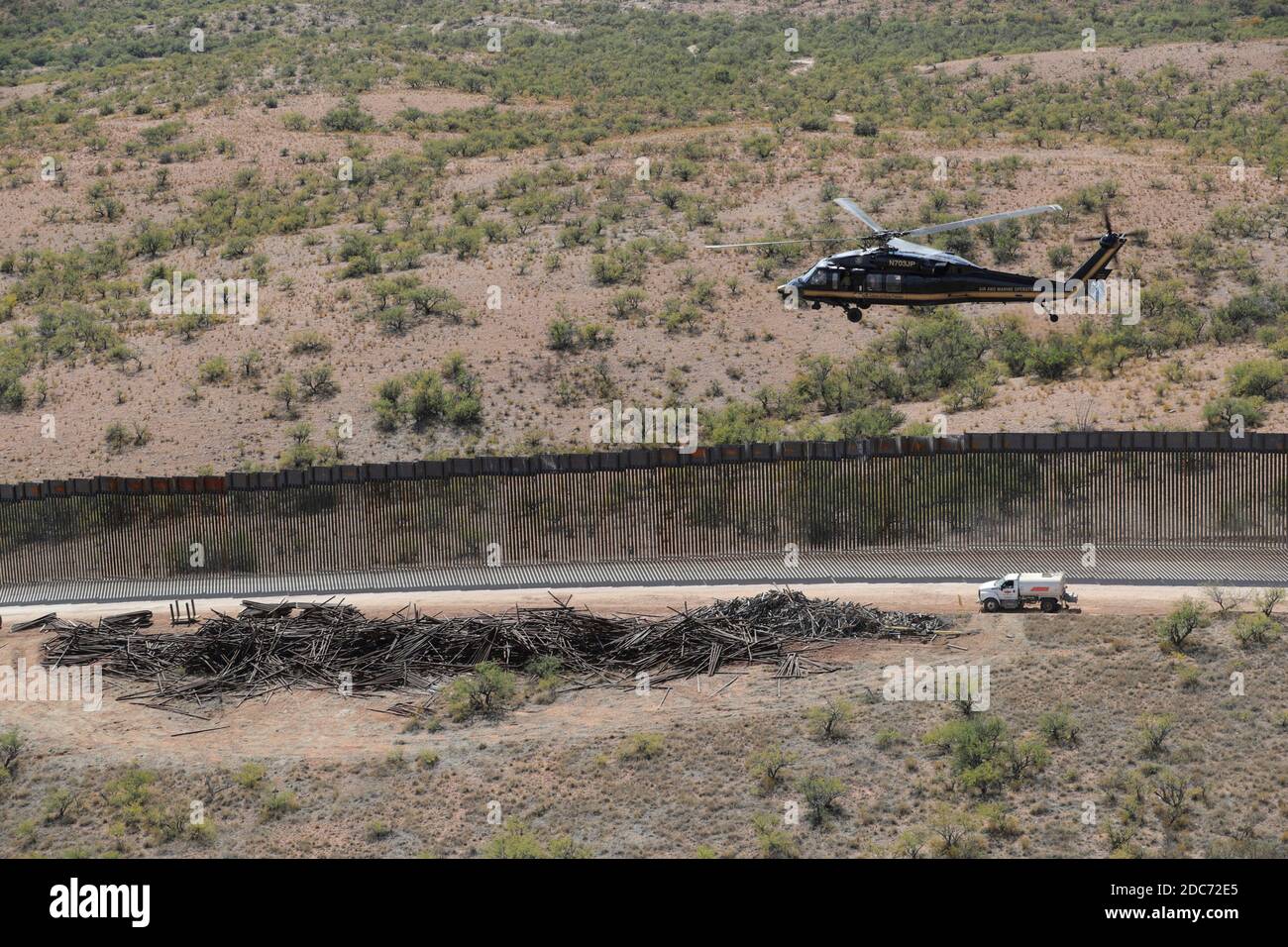 U.S. Department of Homeland Security Acting Deputy Secretary Ken Cuccinelli tours a newly constructed section of the Trump Wall by helicopter in the Tucson Sector November 2, 2020 near Tucson, Arizona. Stock Photo