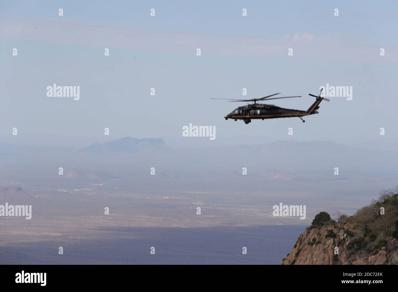U.S. Department of Homeland Security Acting Deputy Secretary Ken Cuccinelli tours a newly constructed section of the Trump Wall by helicopter in the Tucson Sector November 2, 2020 near Tucson, Arizona. Stock Photo