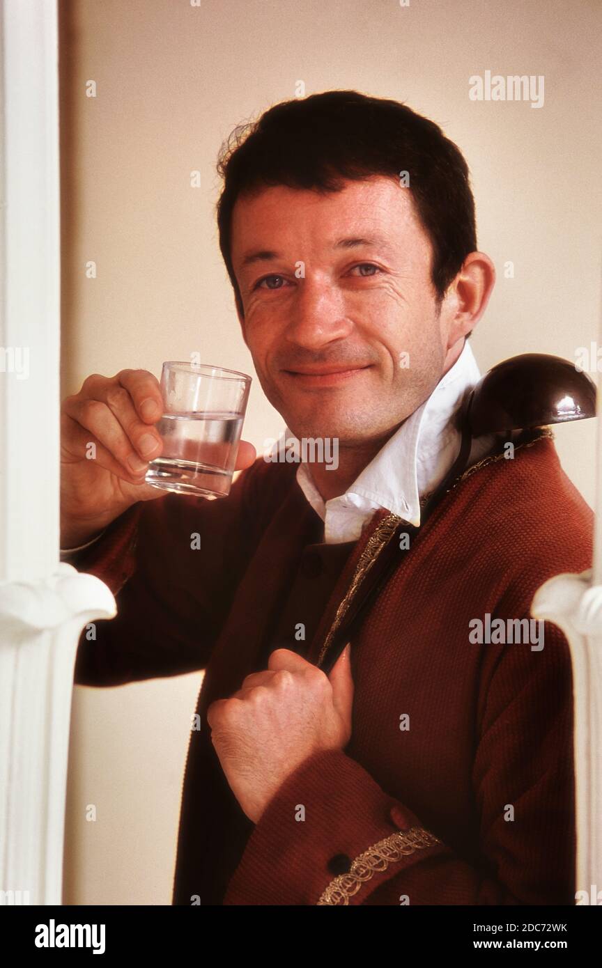 A period costumed dipper with a glass of iron-rich spa water from the ...