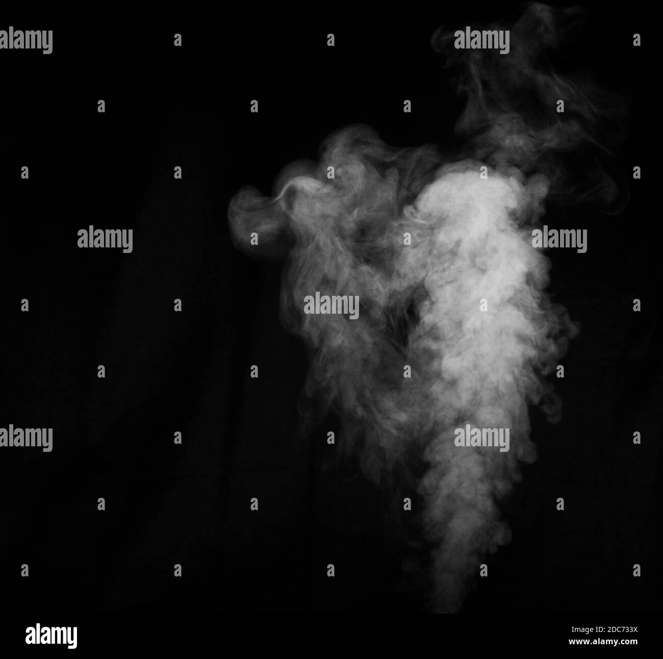 White smoke on black background. Abstract background, design element, for overlay on pictures. Stock Photo