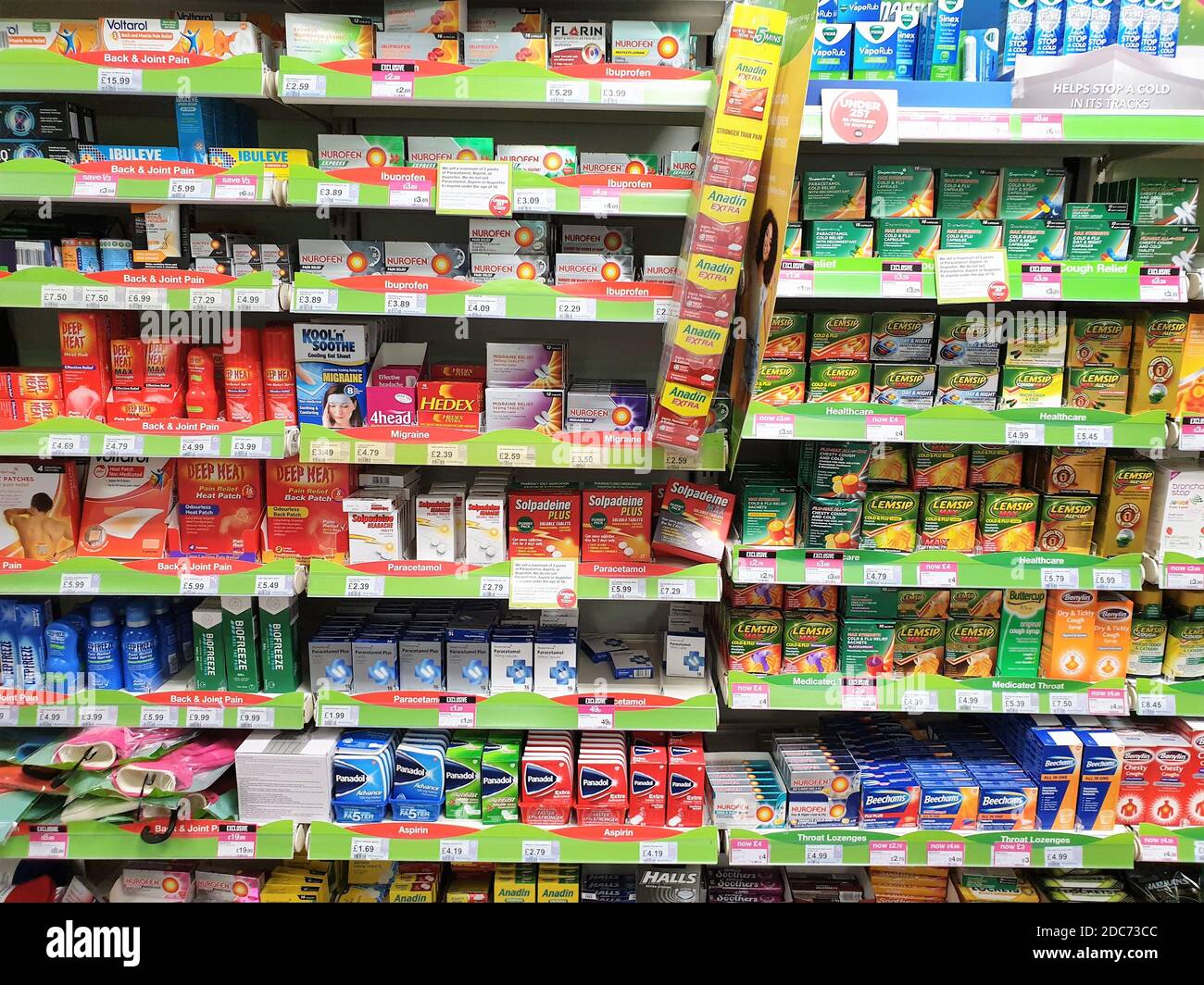 Interior of Superdrug store with display of over the counter medicine Stock Photo