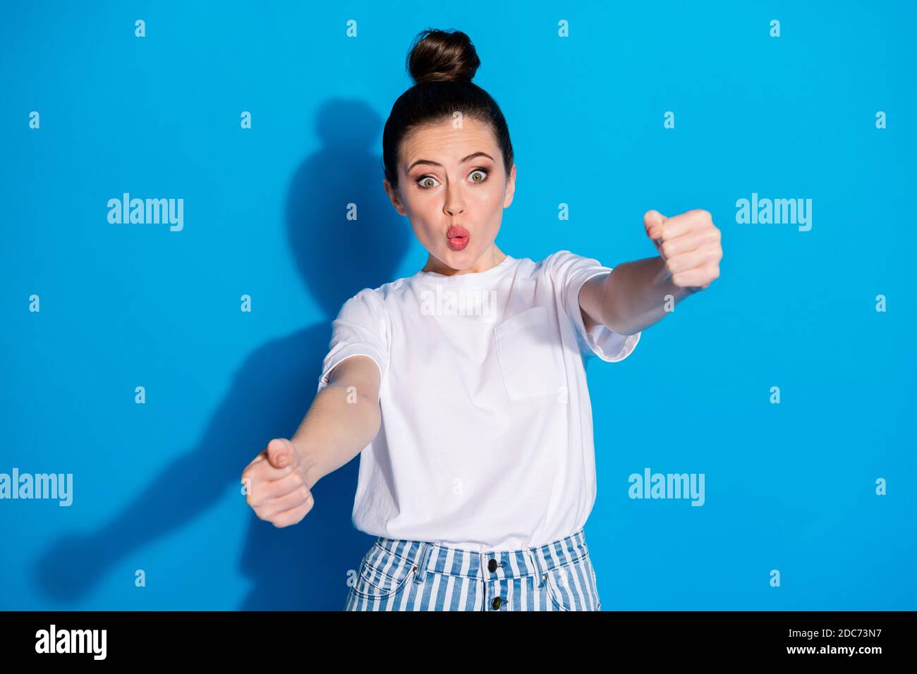 Portrait of astonished girl imagine drive automobile cant control fast