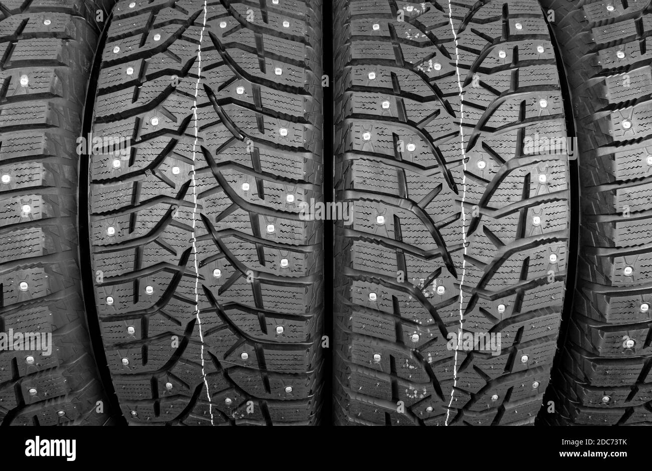 Winter studded tire. Winter car tires background. Tire stack background ...