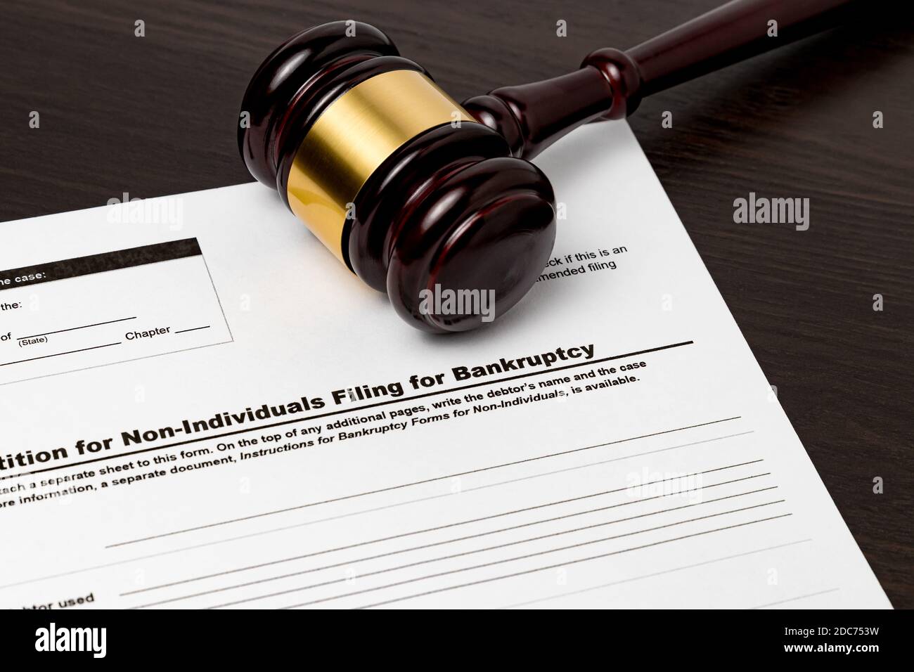 Business bankruptcy petition with gavel. Concept of financial and unemployment crisis, small business debt, economy and recession. Stock Photo