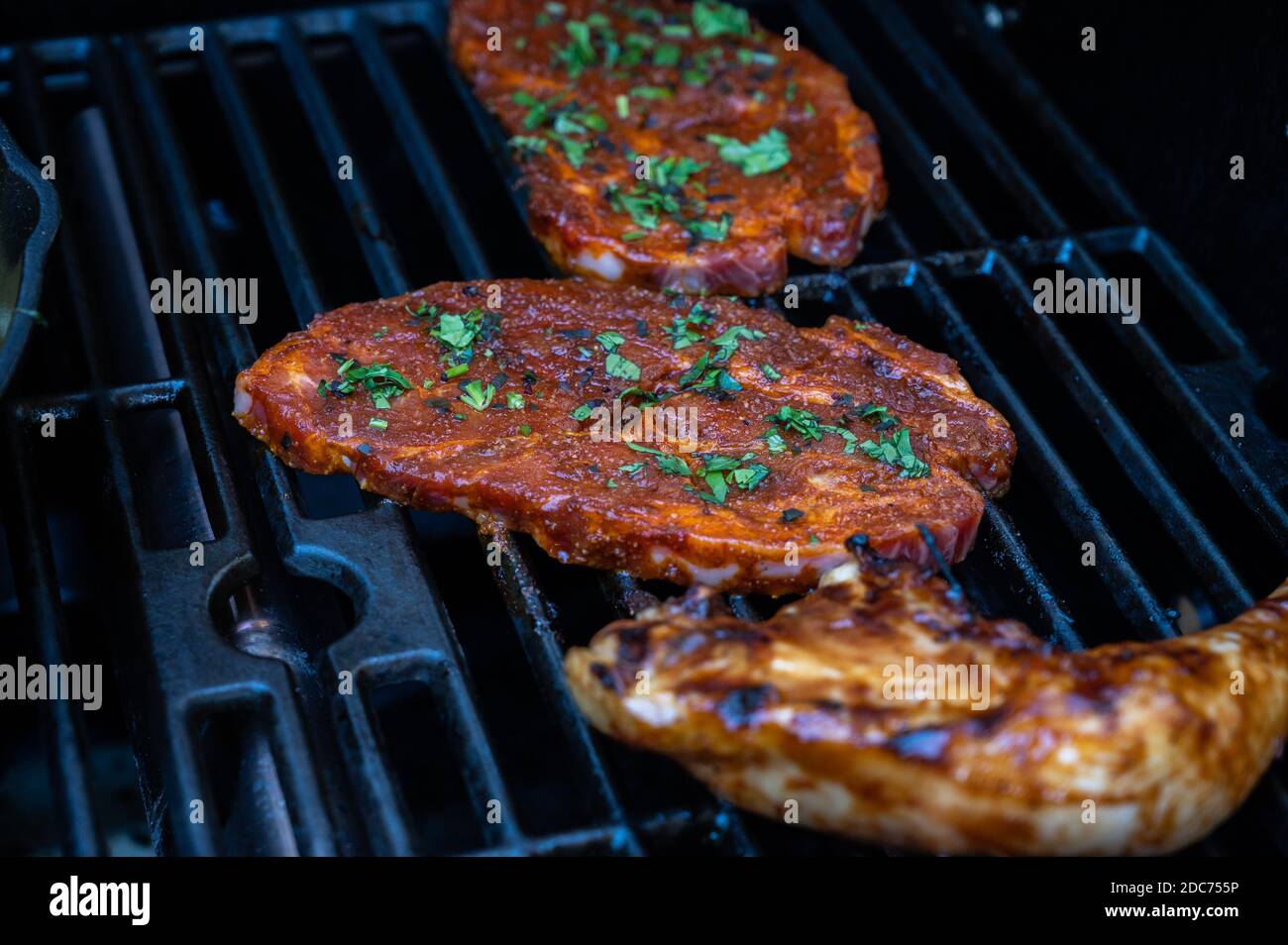 neck of pork in paprika marinade on the grill Stock Photo - Alamy