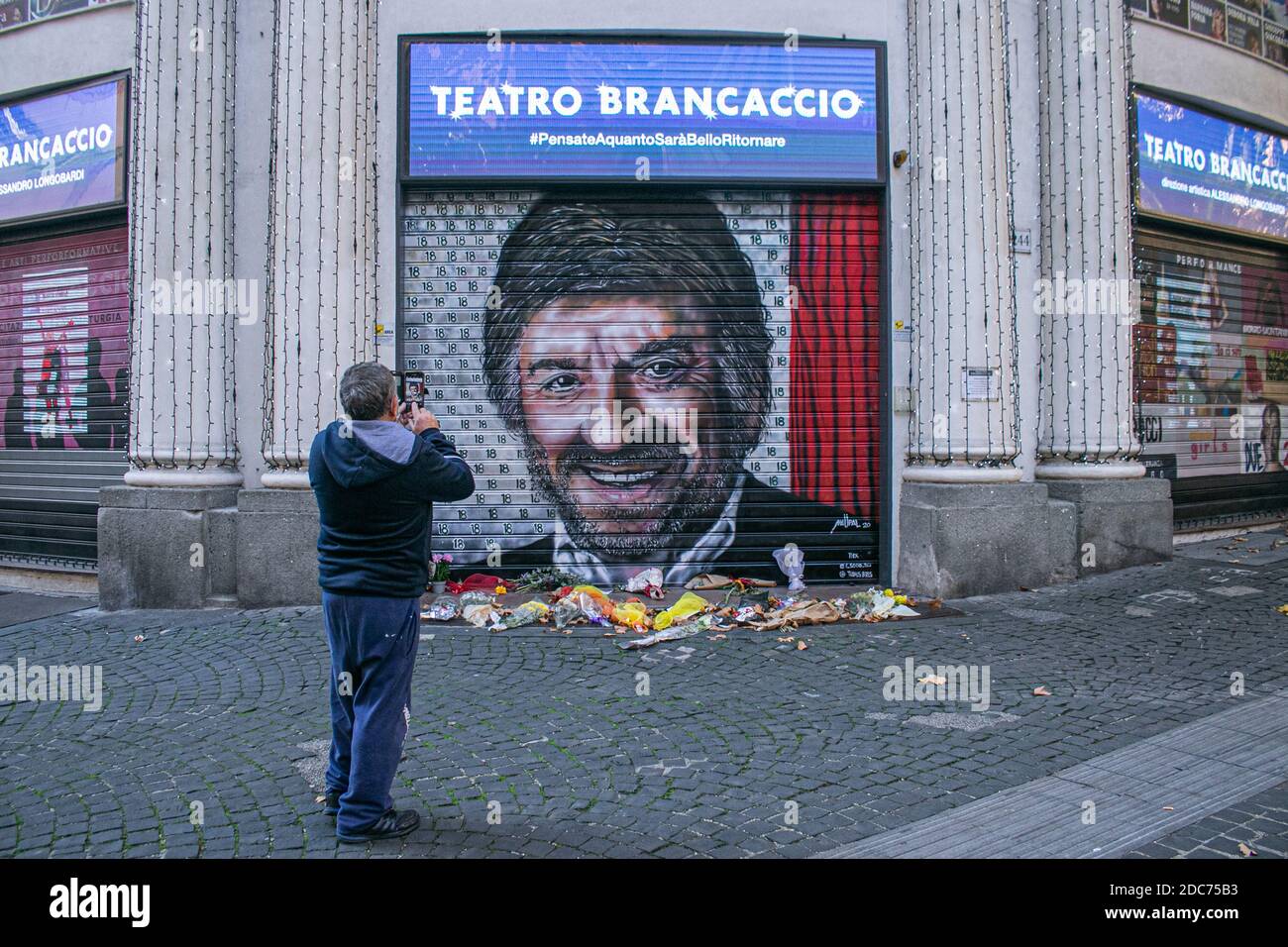ROME ITALY  19 November 2020. The portrait  image of Luigi Gigi Proietti  who died on 2 November  created by The street artist Maupal appears on  the shutters of the Brancaccio Theater in Rome where the Italian actor and comedian  was artistic director from 2001 to 2007. Credit: amer ghazzal/Alamy Live News Stock Photo