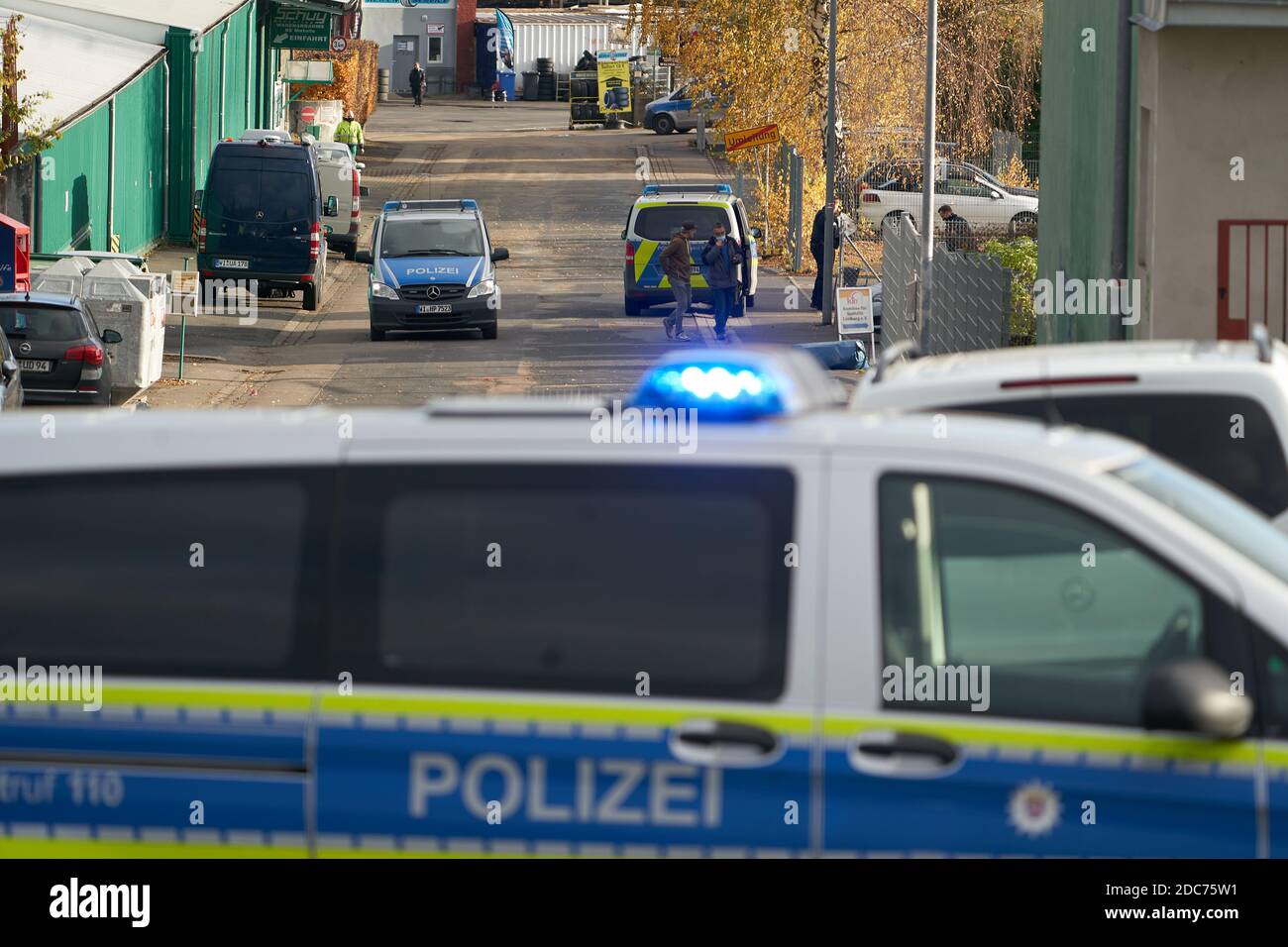 Limburg, Germany. 19th Nov, 2020. Police cars are parked in front of emergency accommodation for homeless people. A resident was found dead. Police are not ruling out violent crime. Credit: Thomas Frey/dpa/Alamy Live News Stock Photo