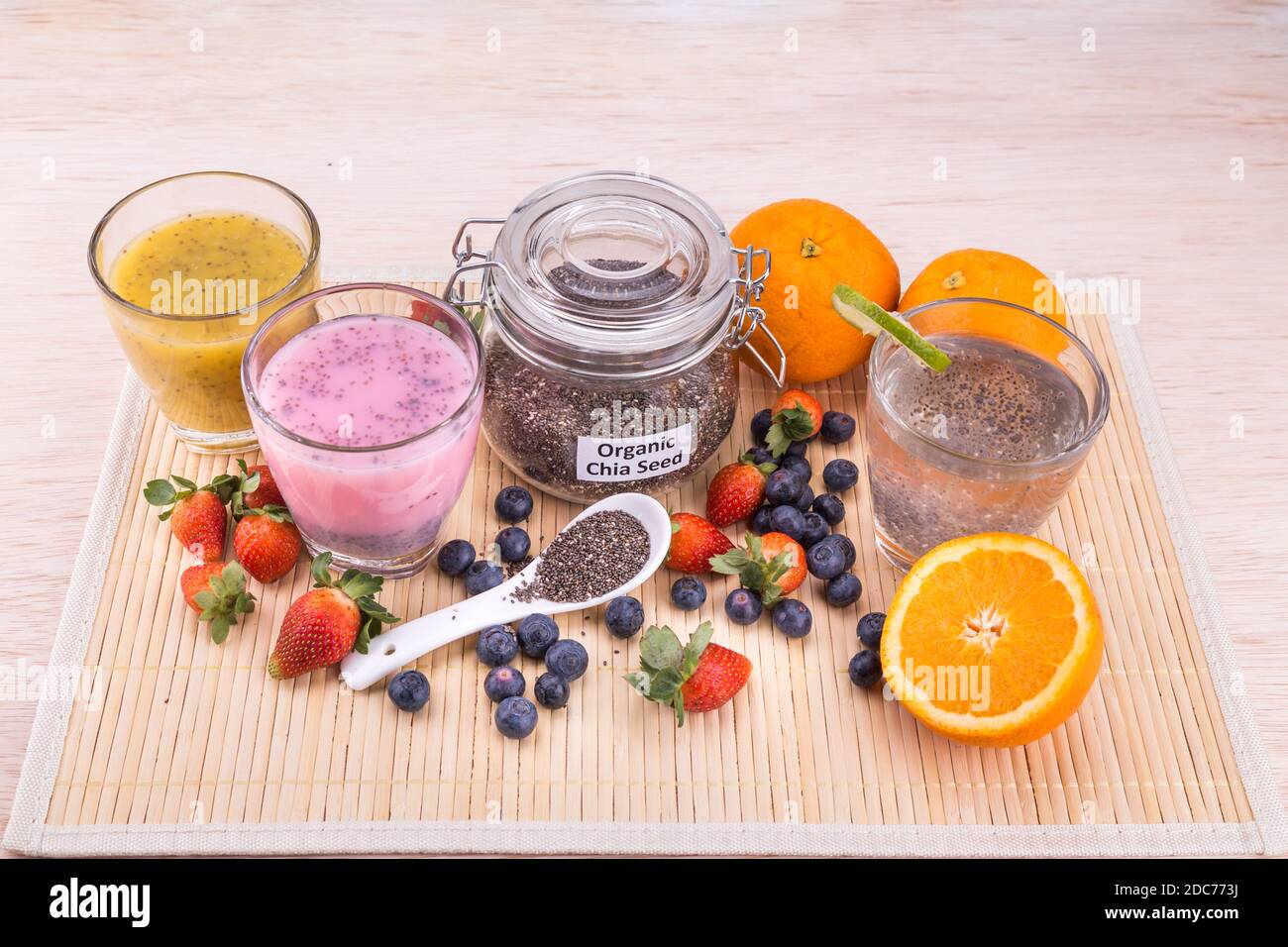 Chia seeds with fresh fruits juice, healthy nutritious anti-oxidant superfood drinks Stock Photo