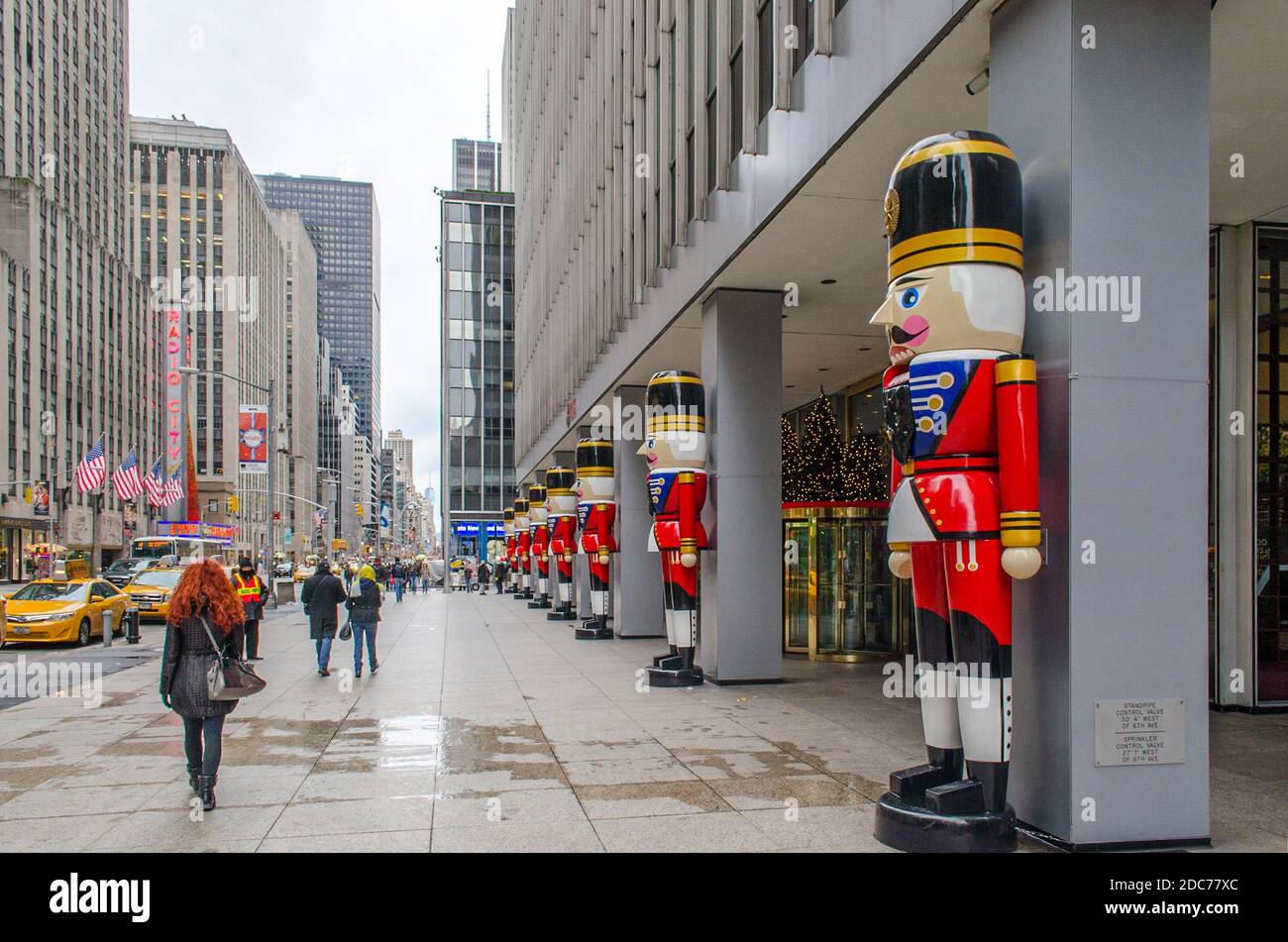 Christmas in Manhattan. Building Decorated with Giant Steadfast Tin Soldiers in a Row.  Beautiful and Celebrating Atmosphere in the Streets. NYC, USA Stock Photo