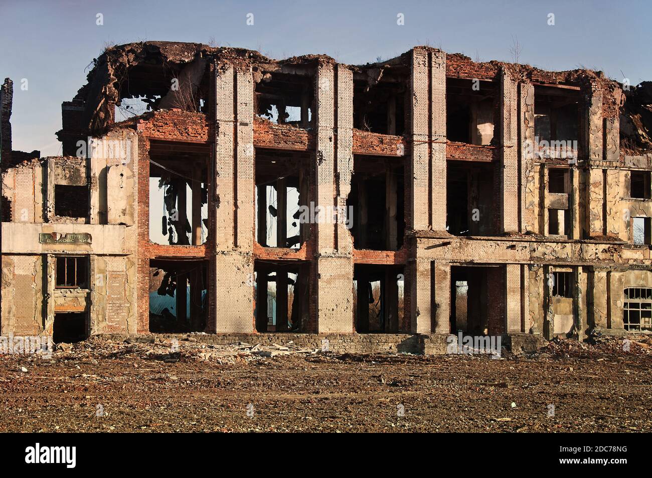 Landscape of ruined buildings at sunset, image of decrepitude or ...