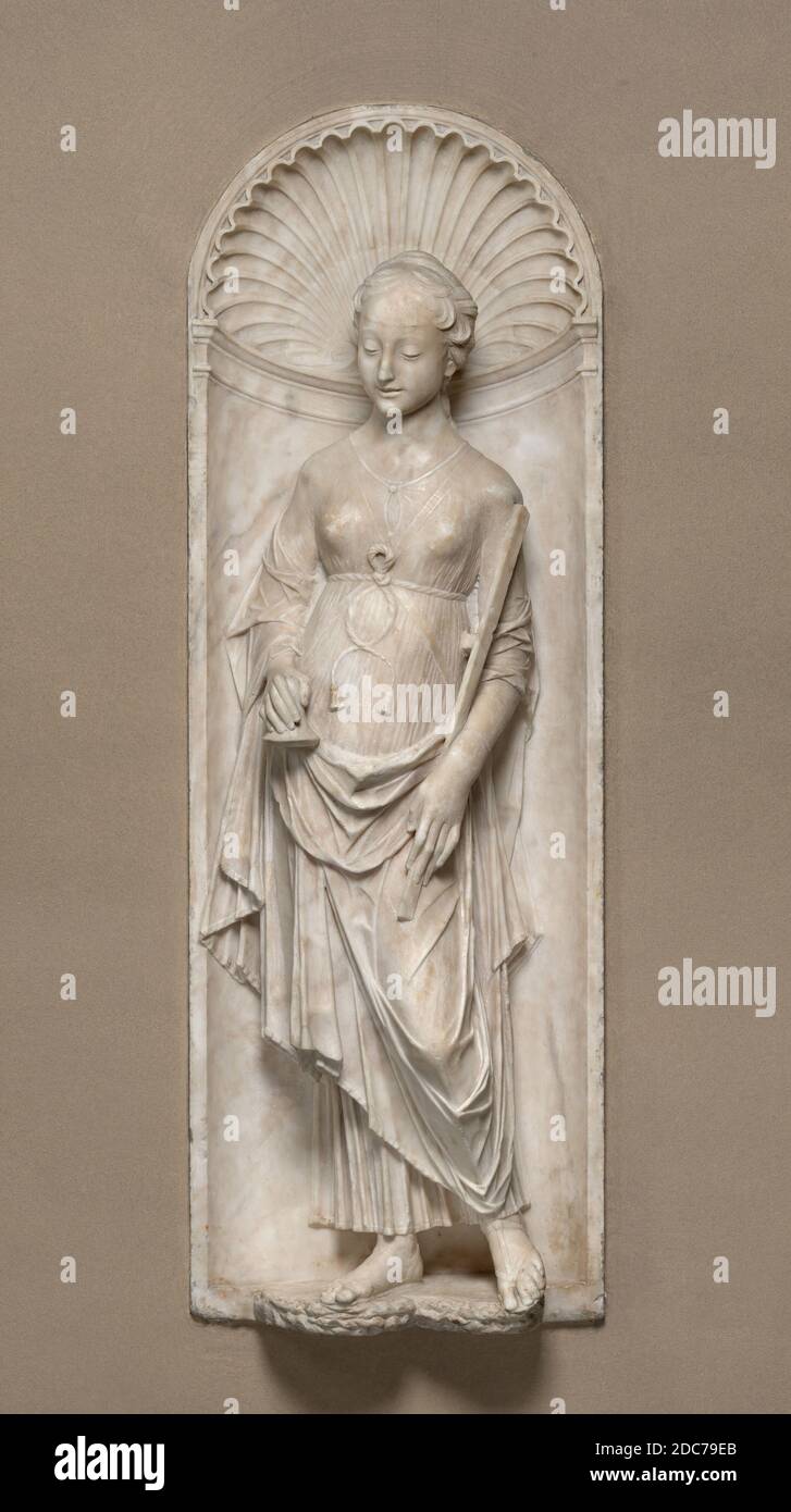 Mino da Fiesole, (artist), Florentine, 1429 - 1484, Faith, 1475/1480, marble, overall: 126 x 43 cm (49 5/8 x 16 15/16 in.), In the art of the Middle Ages and Renaissance, the Virtues were often personified by human figures carrying identifying attributes. Faith in this case had a chalice and a cross, now broken. As represented by Mino da Fiesole, a contemporary of Desiderio da Settignano and Antonio Rossellino, Faith and a companion piece, Charity, appear as slender young girls in clinging, layered gowns with fine pleats. Their heavy mantles are carved in distinctive, angular folds Stock Photo