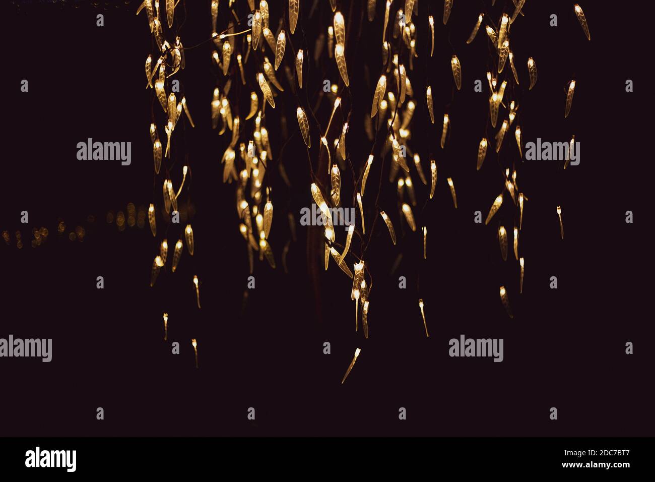 Hanging lights in the dark Stock Photo