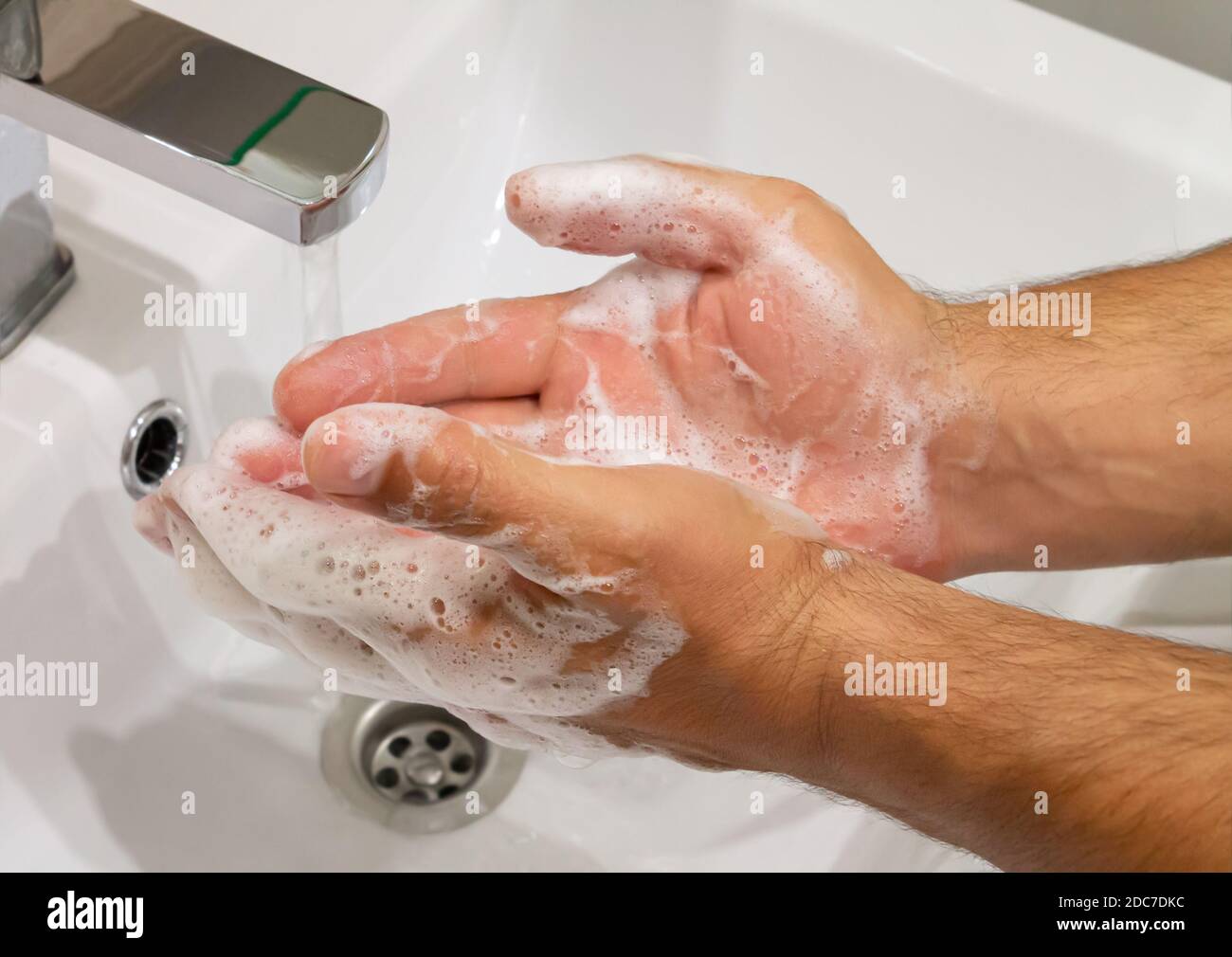 Person washing hands with antibacterial soap Stock Photo Alamy