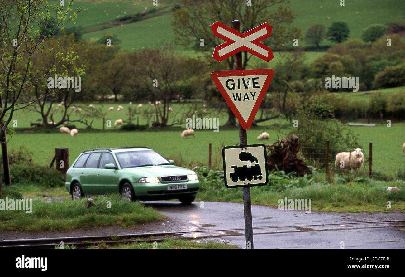 1996 Audi A4 Avant crossing a Railway Level crossing. Stock Photo