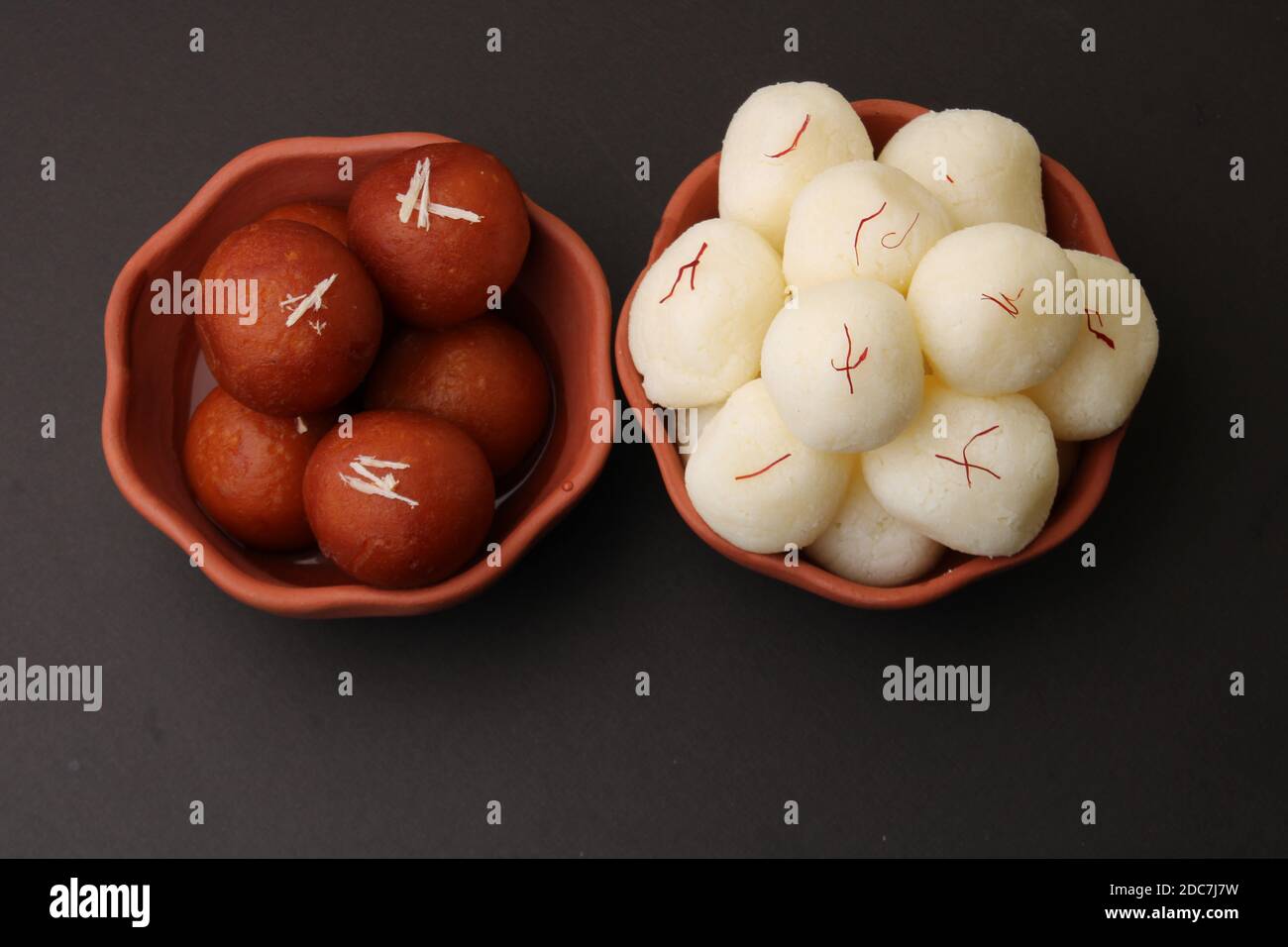 Famous Indian desserts rasgulla/ rosogulla/ roshogulla and gulab jamun