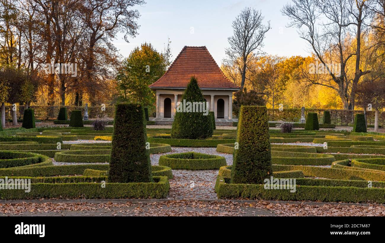 The formal garden outside Wolfsburg Castle is a famous place to visit when in town. Couples go there for romantic walks in beautiful surroundings. Stock Photo