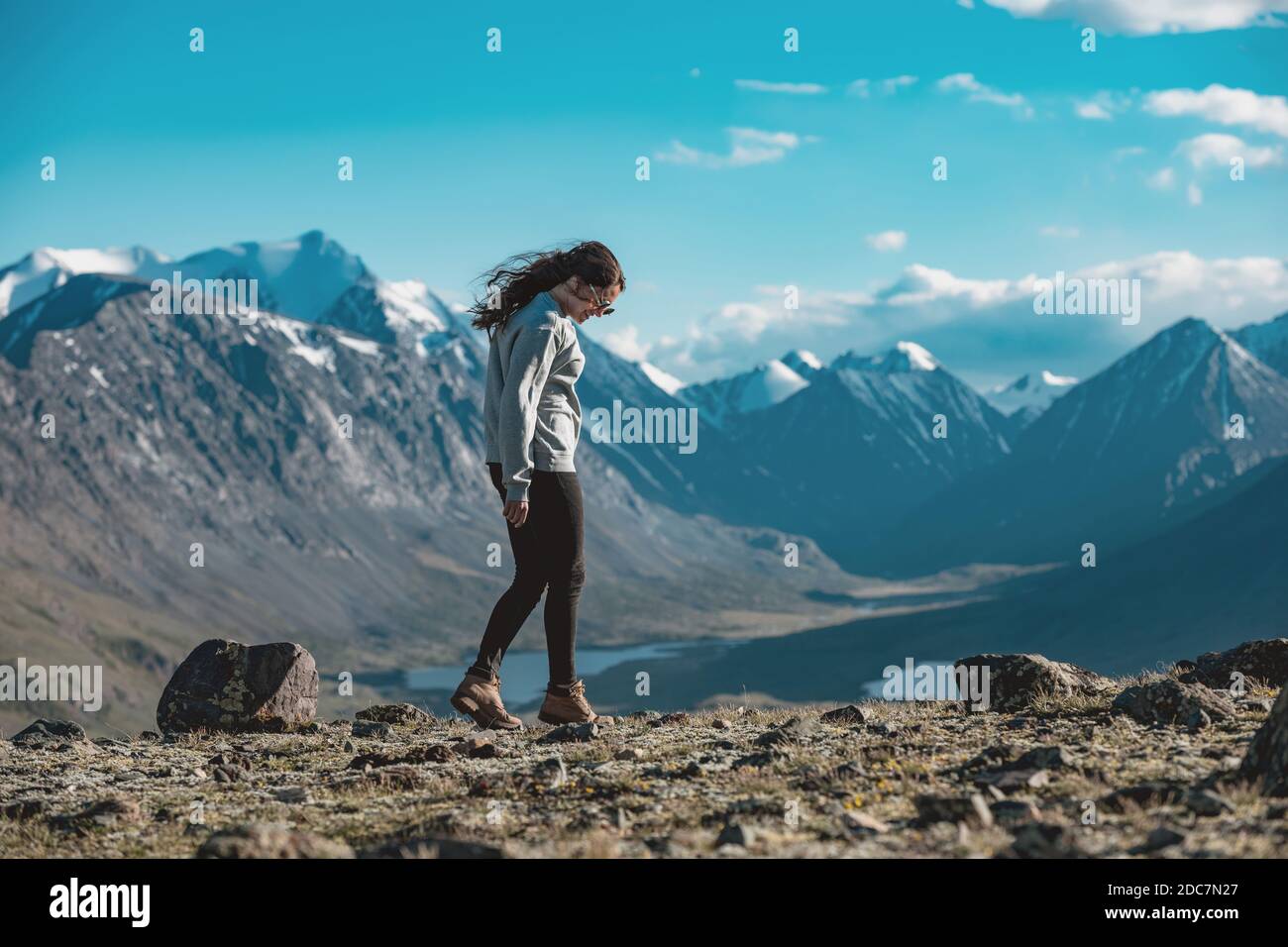 One beautiful sporty girl relax and walks in mountains Stock Photo