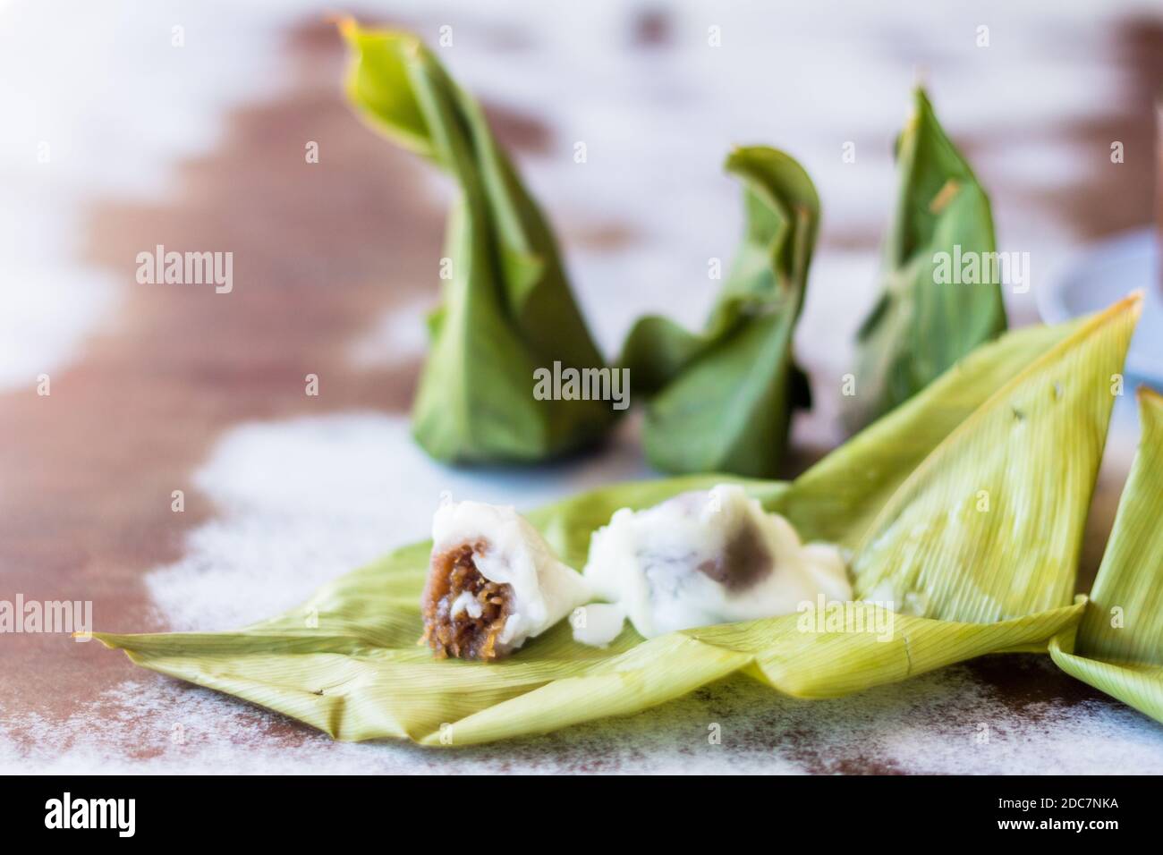 Traditional Thai rice cakes in banana leaves in Phuket, Thailand Stock Photo
