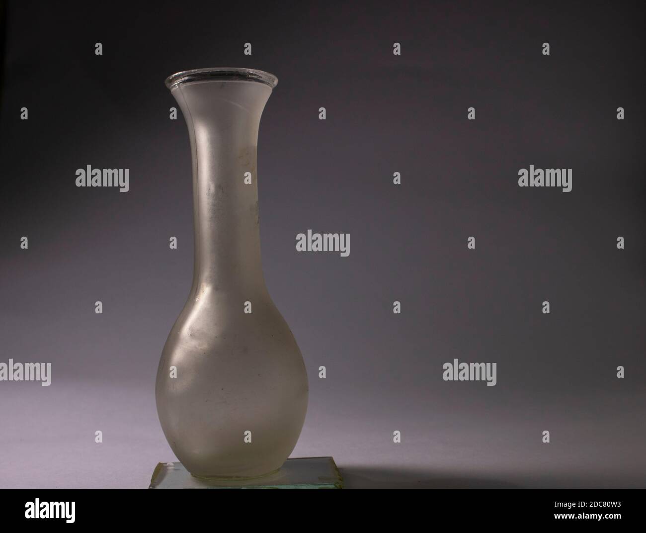 empty glass vase on fade background Stock Photo