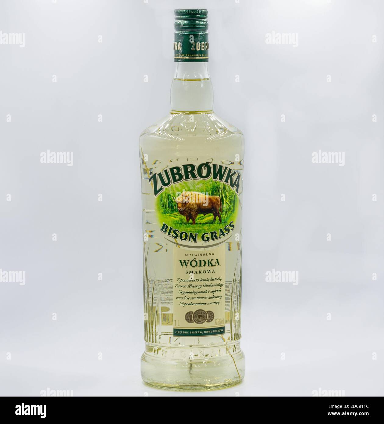KYIV, UKRAINE - OCTOBER 23, 2020: Zubrowka Bison Grass vodka bottle closeup against white background. It is a flavored Polish vodka liqueur, which con Stock Photo