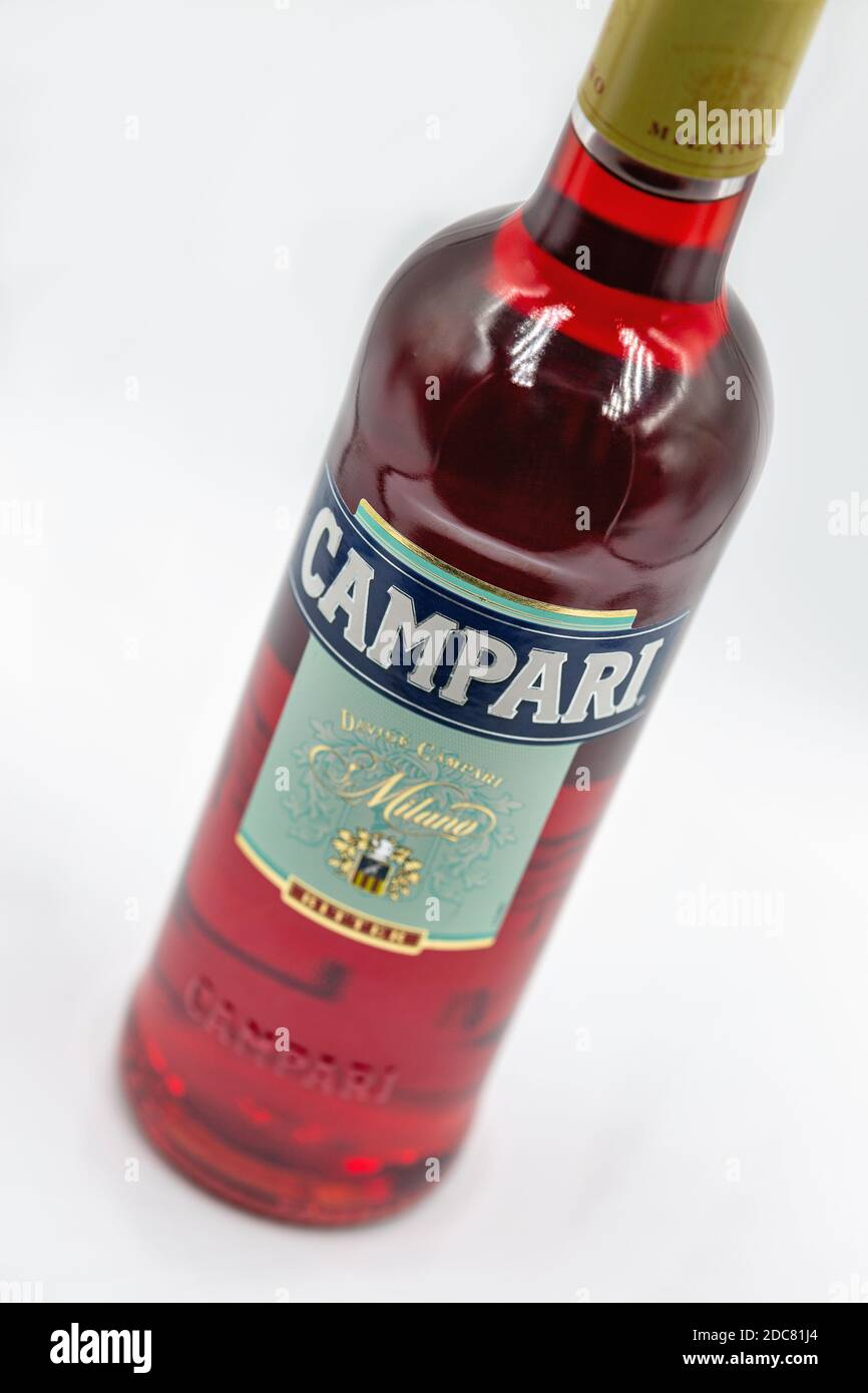 KYIV, UKRAINE - OCTOBER 31, 2020: Bottle of Campari Bitter Liqueur closeup against white. Classic Italian bitter liqueur is made using a blend of herb Stock Photo