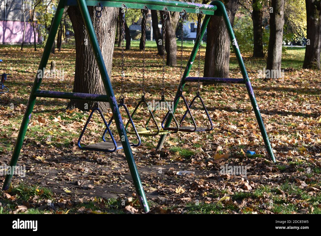 childless swings in the park in the covid-19 era Stock Photo