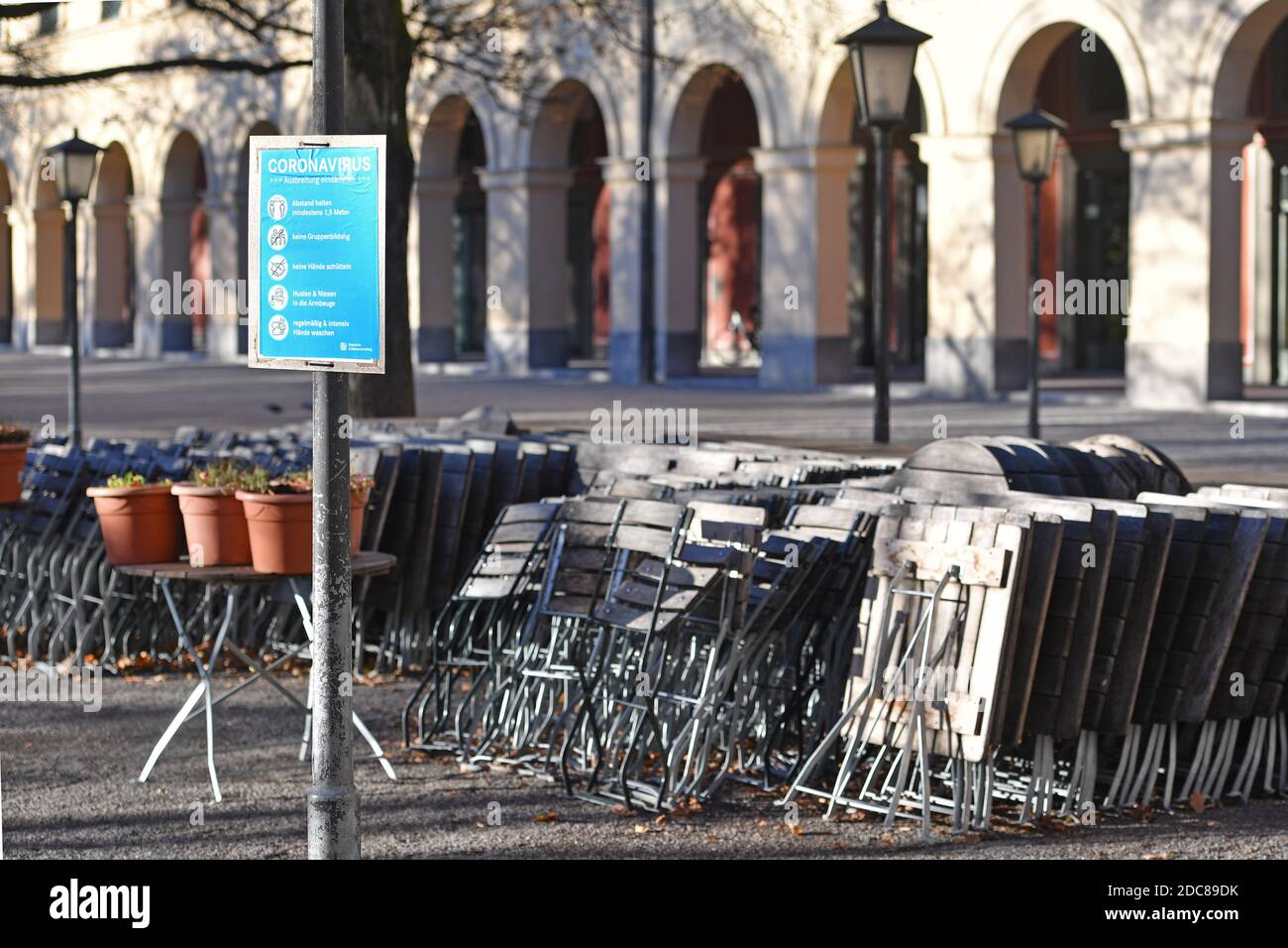 Munich, Deutschland. 18th Nov, 2020. Topic picture: Second wave of the coronavirus pandemic/consequences for the catering trade Stacked chairs and tables in a beer garden in the Hofgarten in Munich on November 18, 2020. | usage worldwide Credit: dpa/Alamy Live News Stock Photo