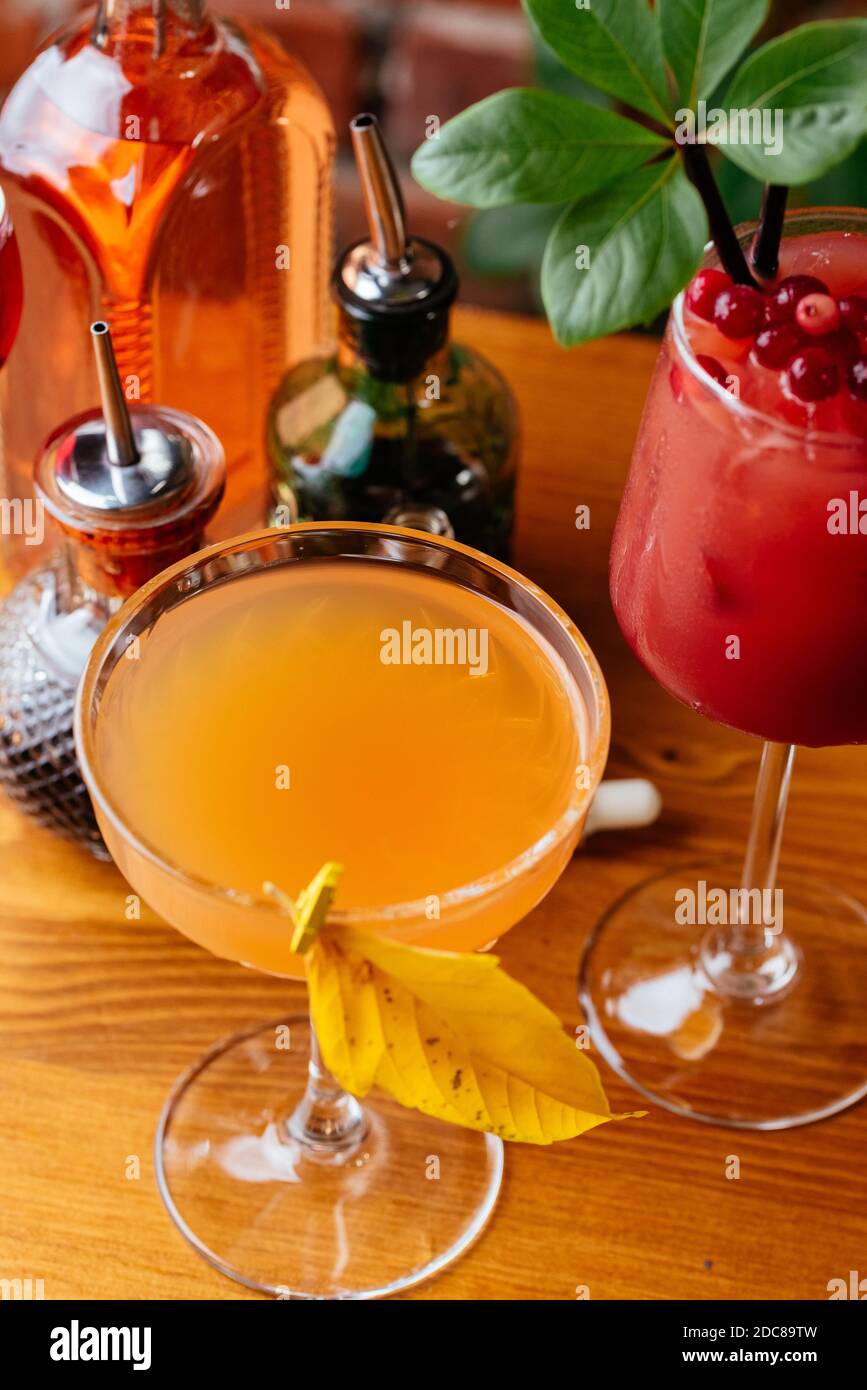 autumn cocktails on a brick wall background Stock Photo Alamy