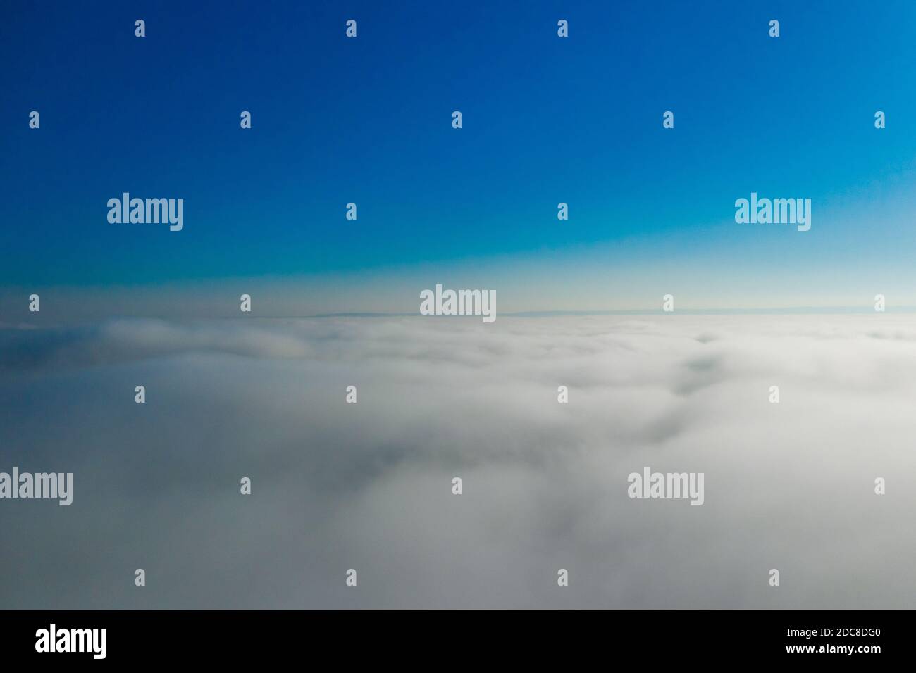 Between blue sky and white clouds. In the heaven Stock Photo - Alamy