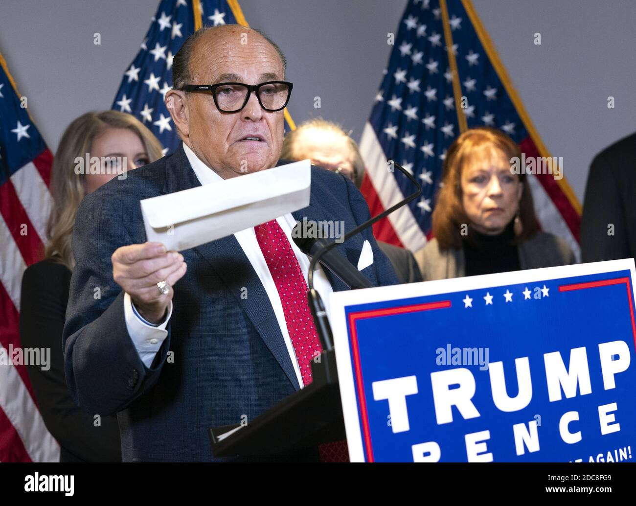 Washington, United States. 19th Nov, 2020. Rudy Giuliani, President Donald Trump's campaign legal advisor, holds an envelope representing mail-in voting as he speaks on the election results, at the Republican National Committee headquarters in Washington, DC on Thursday, November 19, 2020. Photo by Kevin Dietsch/UPI Credit: UPI/Alamy Live News Stock Photo