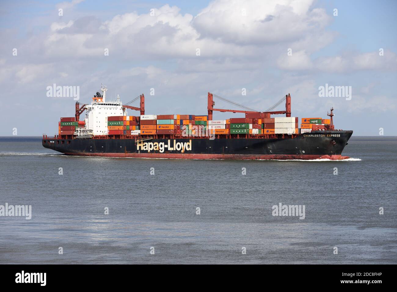 The container ship Charleston Express will pass Cuxhaven on August 22, 2020 on its way to Hamburg. Stock Photo
