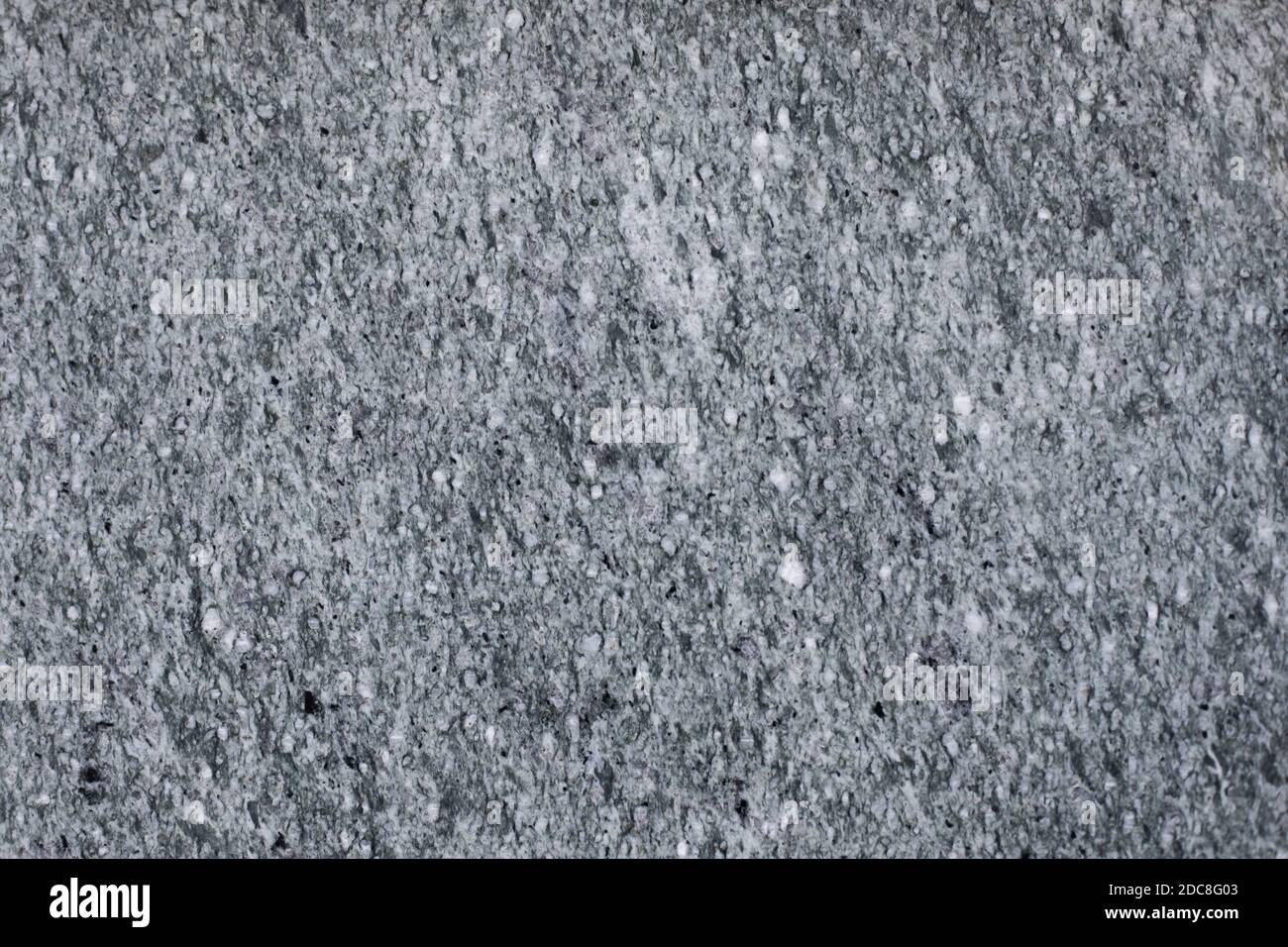 Gray polished marble surface with fine white dots, natural stone background backdrop design Stock Photo