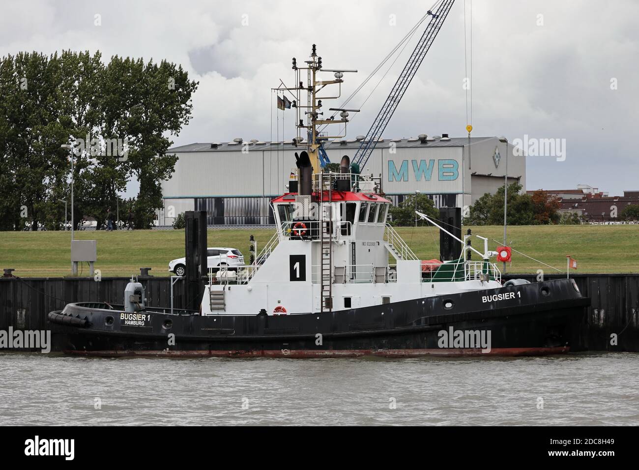 The port tug Bugsier 1 will be in Bremerhaven on August 24, 2020 on the Weser at the pier. Stock Photo