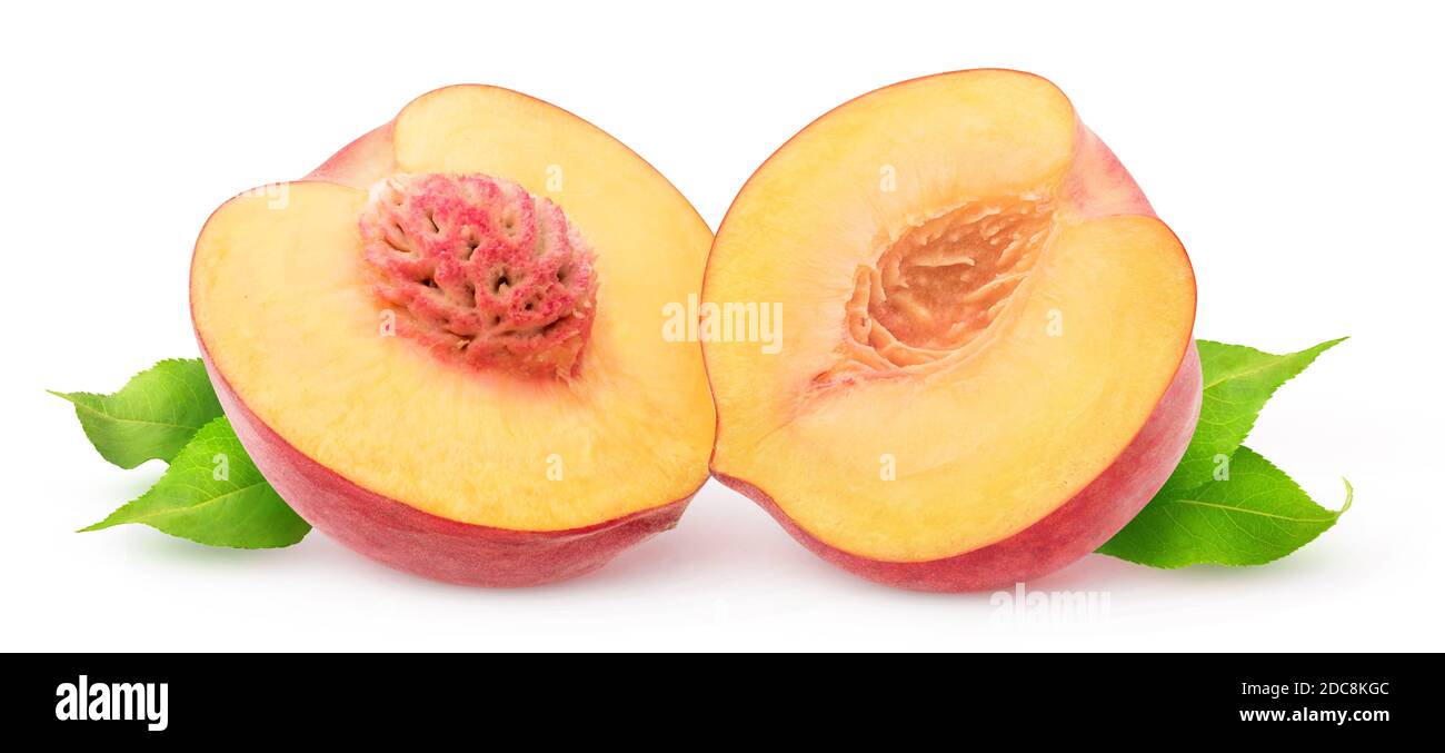 Isolated halved peach. Fresh peach fruit cut in half isolated on white background Stock Photo