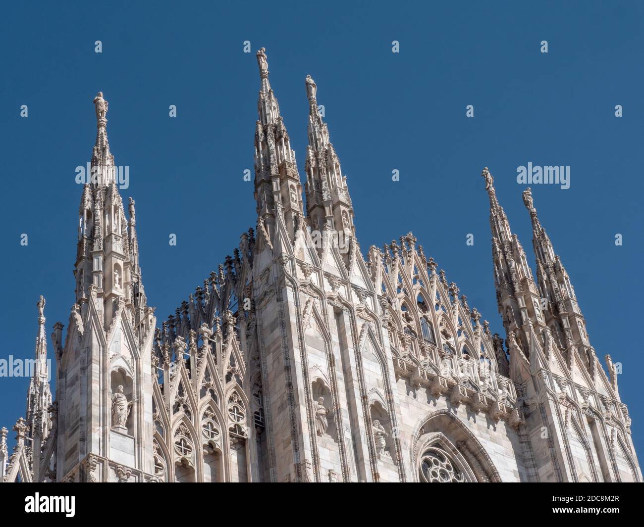 Exterior detail of the west front façade of Milan Cathedral - Duomo di Milano -  Milan, Lombardy, Italy. Stock Photo