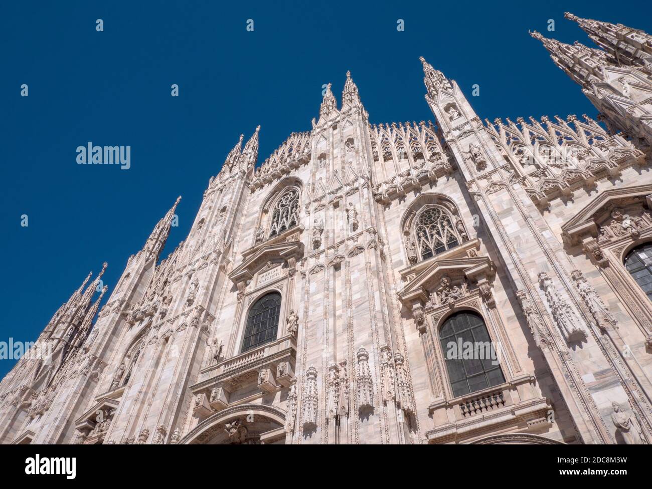 Exterior detail of the west front façade of Milan Cathedral - Duomo di Milano - Milan, Lombardy, Italy. Stock Photo