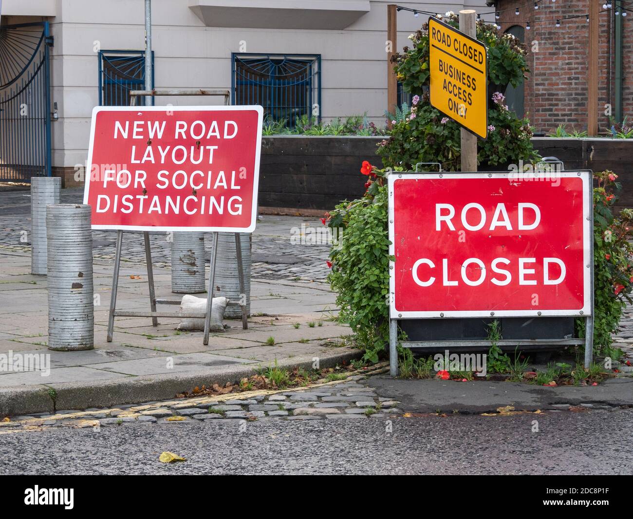 Belfast, Northern Ireland, UK, 19 November 2020: Road signs, Dunbar Street notifying of new road layout for social distancing Stock Photo