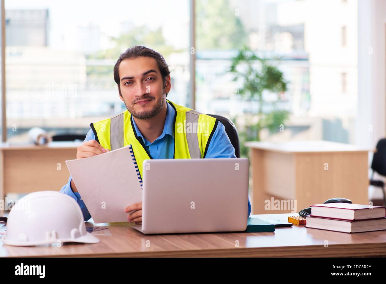 Young architect working in the office Stock Photo