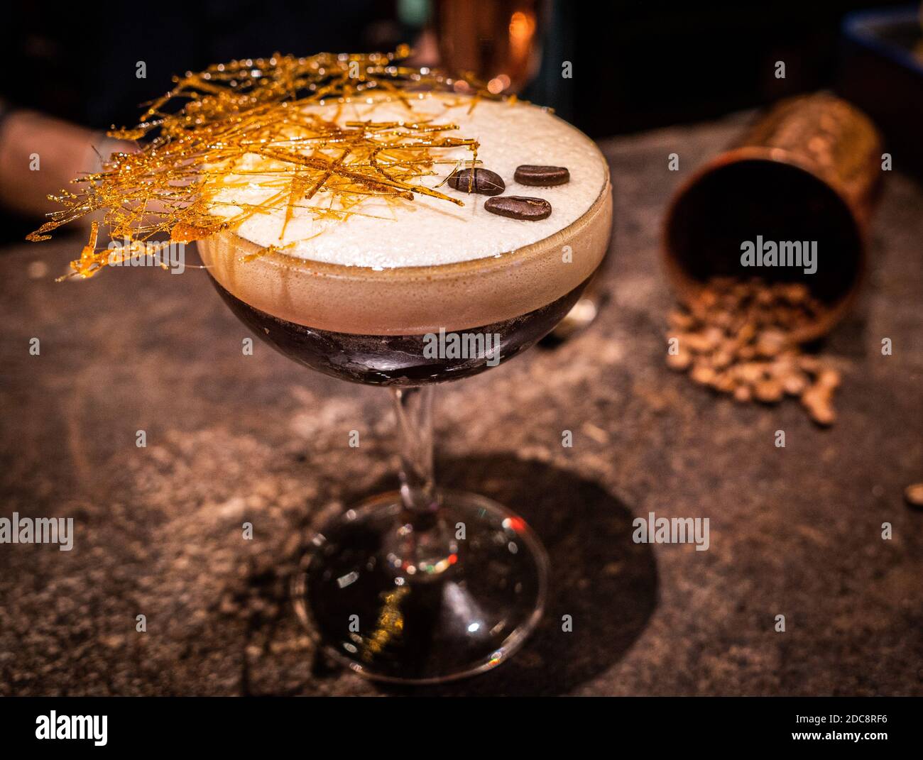 Espresso martini, with coffee beans on the background Stock Photo