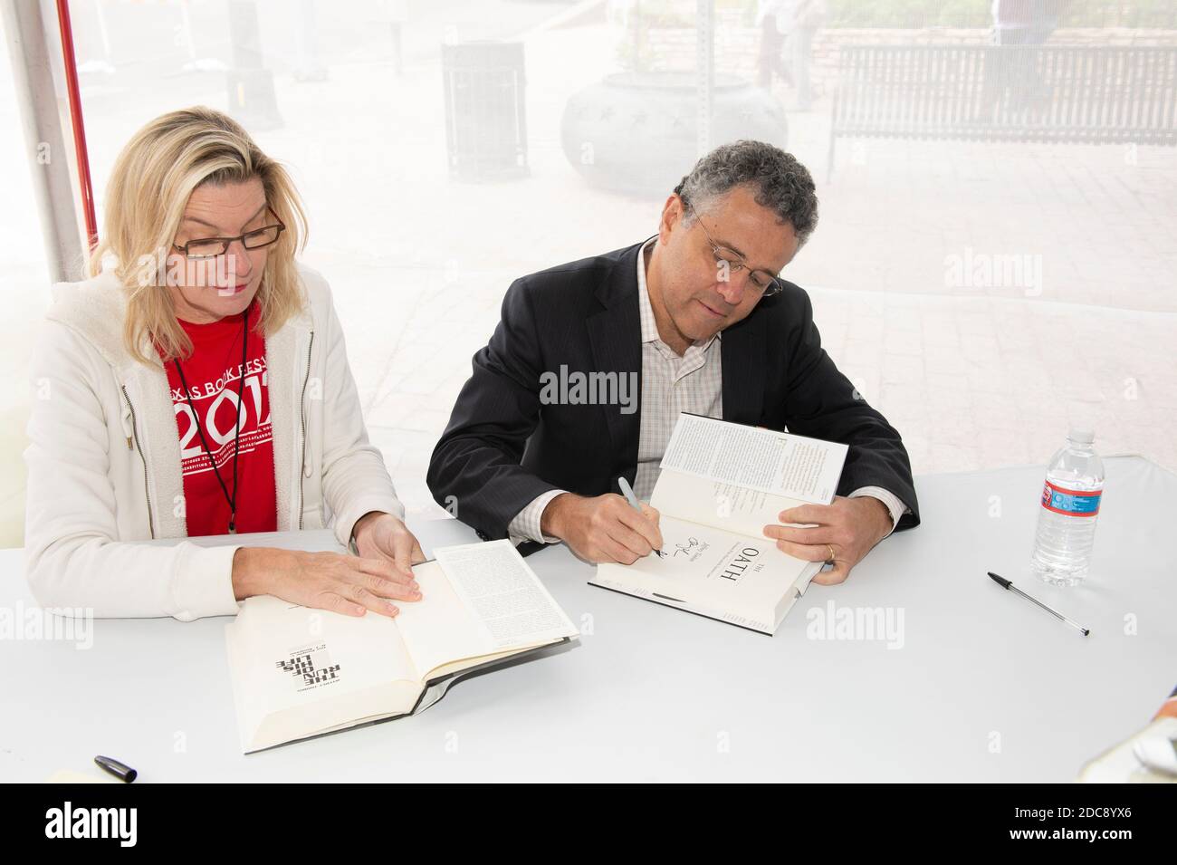 Noted legal analyst, lawyer, blogger and author Jeffrey Toobin signs books after delivering a keynote speech at the Texas Book Festival on October 27, 2012. Toobin's appearance coincided with the publication of one of his many books, 'The Oath' about the Obama White House and the Supreme Court. Stock Photo