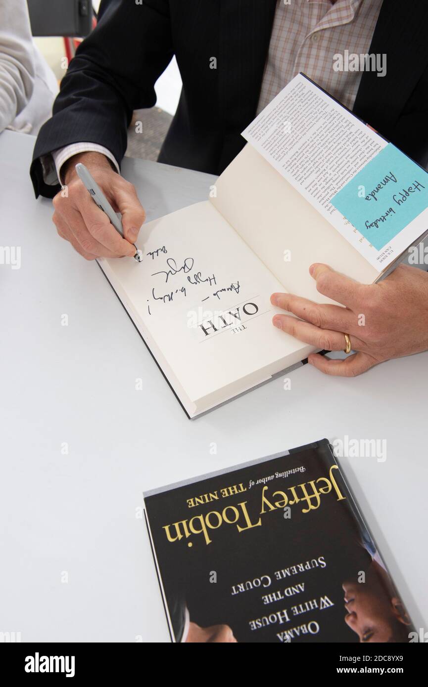 Noted legal analyst, lawyer, blogger and author Jeffrey Toobin signs books after delivering a keynote speech at the Texas Book Festival on October 27, 2012. Toobin's appearance coincided with the publication of one of his many books, 'The Oath' about the Obama White House and the Supreme Court. Stock Photo