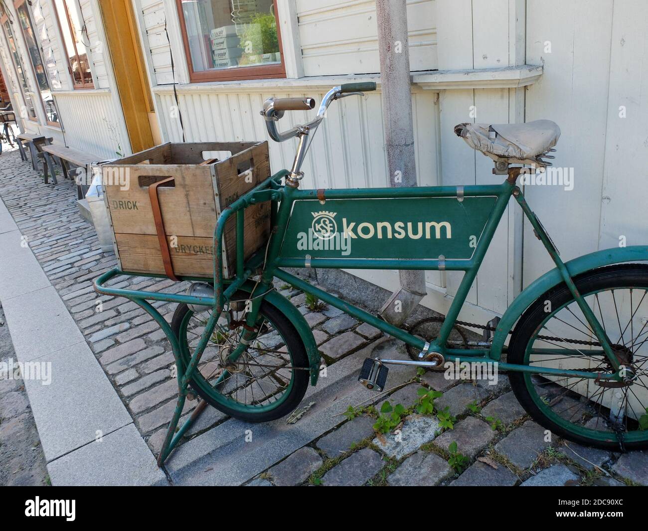 Konsum bicycle in the streets of Skansen. Konsum is a name used for grocery stores within the Cooperative Association in the 20th century Stock Photo